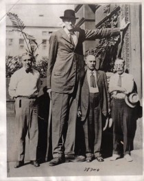 Bernard A. Coyne of Iowa stood 8 feet 2 inches tall and weighed 300 pounds. He died in 1921 at the age of 23. 
